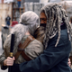 Carol (Melissa McBride), Henry (Matt Lintz), and Ezekiel (Khary Payton) have a happy family reunion.